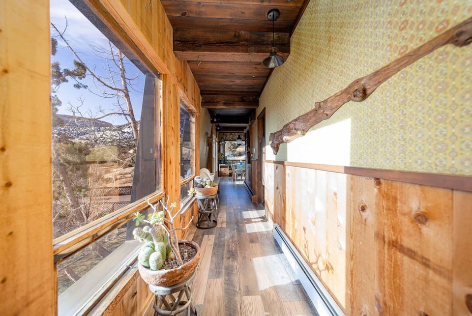 Hallway leading to kitchen.  Laundry on right