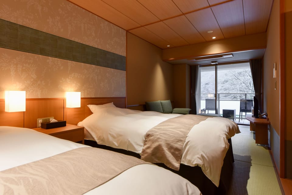 Standard Room with Tatami Floor and Open-air Bath (A) | Down comforters, desk, WiFi (free), individually decorated
