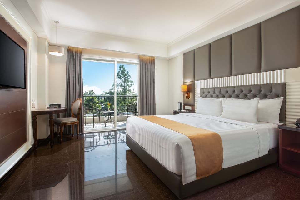 Deluxe Room, 1 Double Bed, Balcony | 1 bedroom, in-room safe, soundproofing, free WiFi
