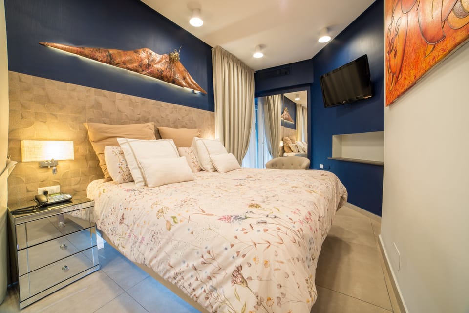 Junior Suite, Multiple Beds | Premium bedding, in-room safe, individually decorated, desk
