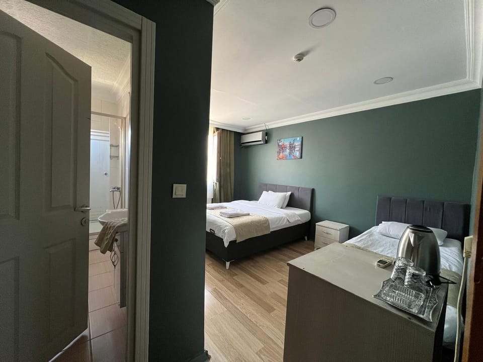 Standard Double Room, 1 Queen Bed | Laptop workspace, WiFi (free), bed sheets