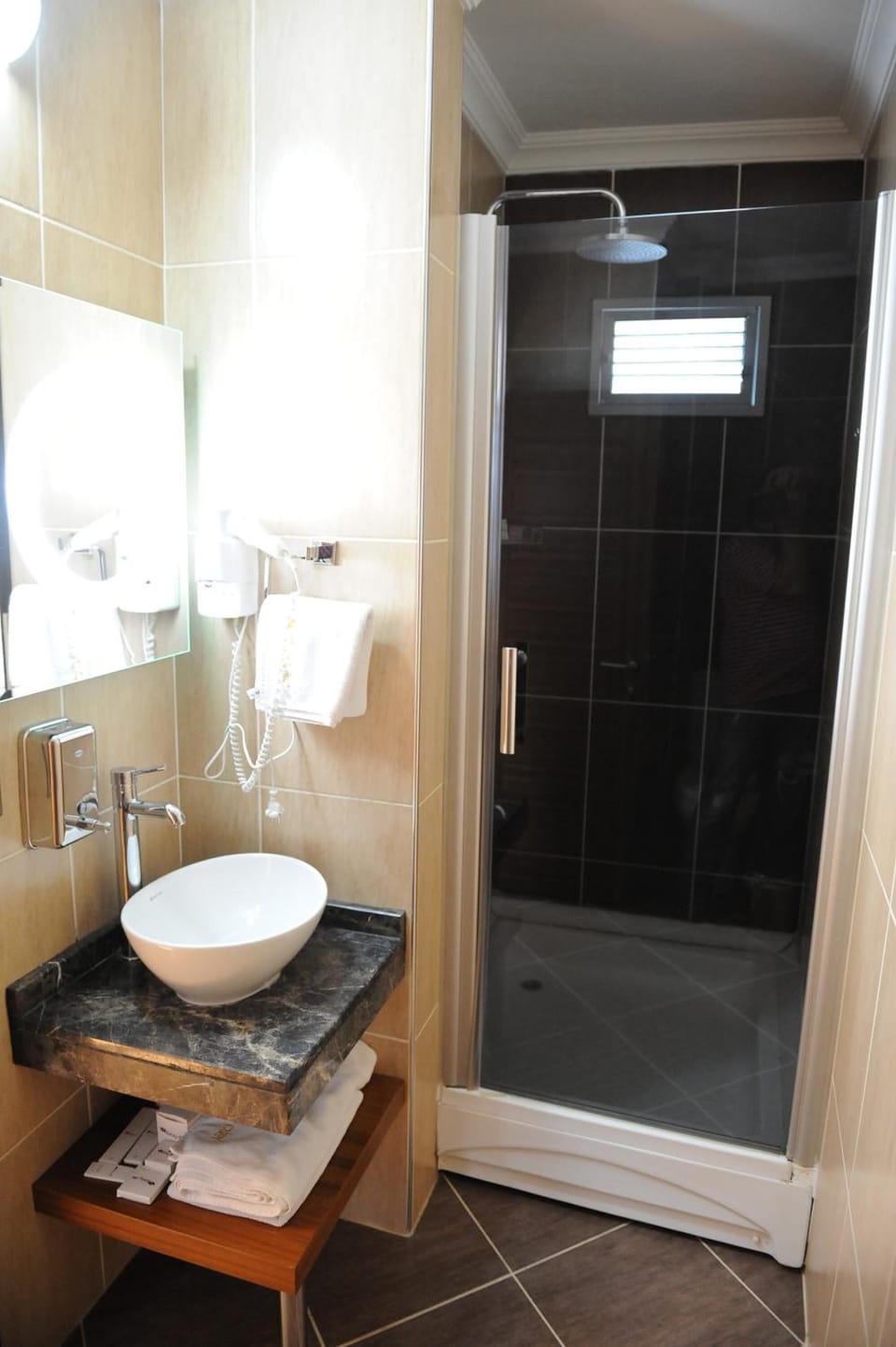 Shower, free toiletries, hair dryer, slippers