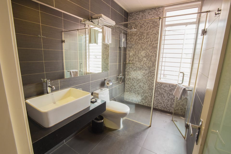 Shower, free toiletries, hair dryer, slippers