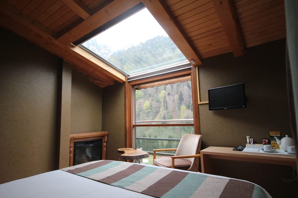 Honeymoon Double Room | Living area | LCD TV