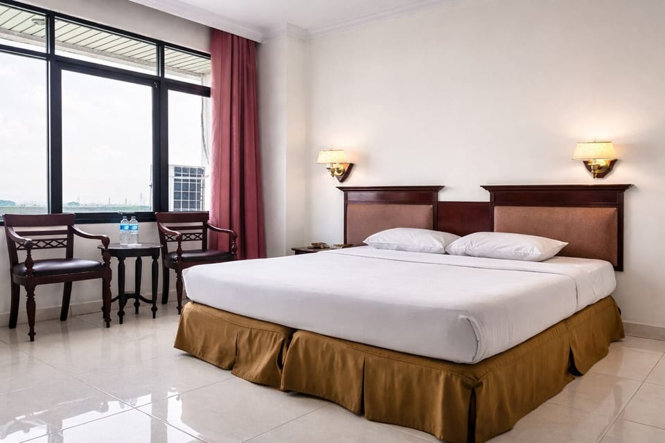 Deluxe Double Room | Desk, blackout drapes, free WiFi, bed sheets
