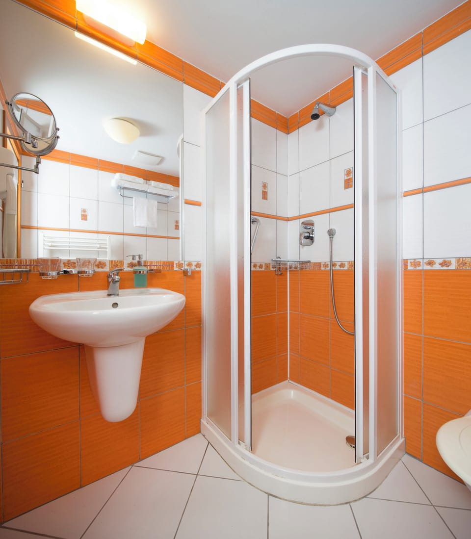 Shower, free toiletries, hair dryer, bathrobes