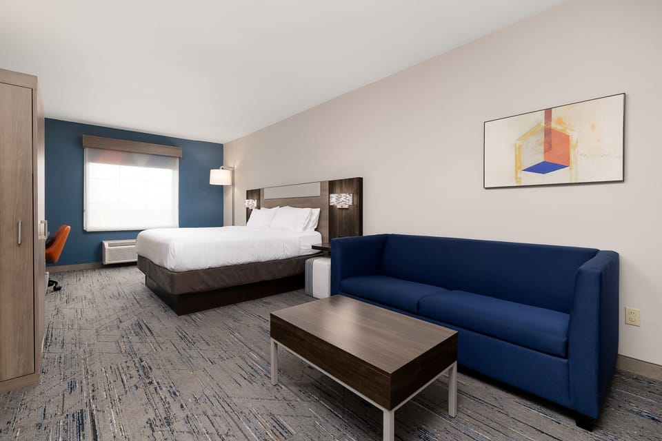 Suite, 1 King Bed (Additional Living Area) | In-room safe, desk, iron/ironing board, free cribs/infant beds