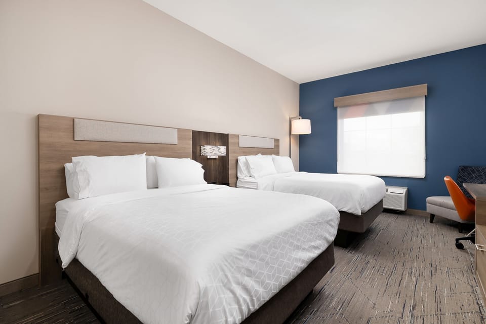 Standard Room, 2 Queen Beds | In-room safe, desk, iron/ironing board, free cribs/infant beds