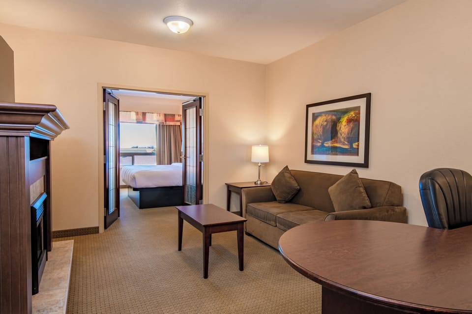 Superior Studio Suite | Living area | 32-inch LCD TV with cable channels, TV