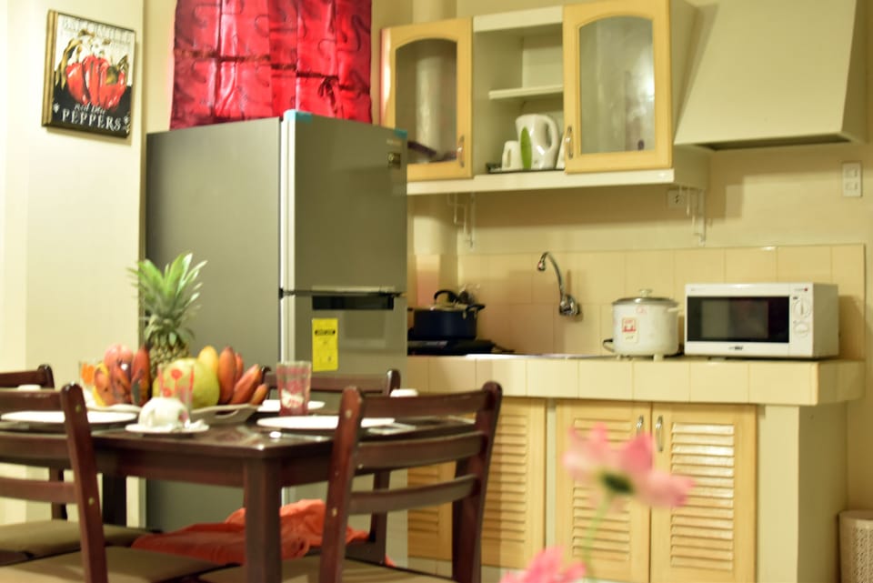 Family Townhome with Suite Rooms | Private kitchen | Microwave, coffee/tea maker, electric kettle
