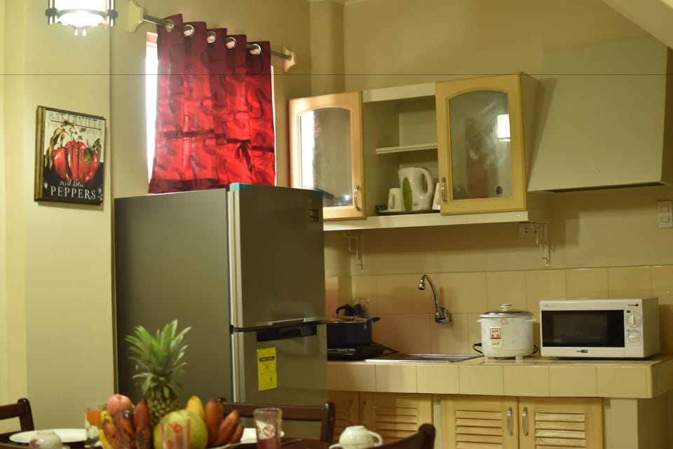 Family Townhome with Suite Rooms | Private kitchenette | Microwave, coffee/tea maker, electric kettle
