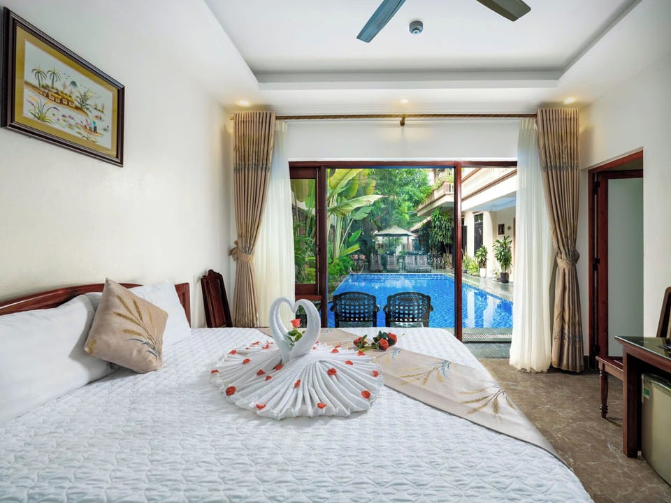 Deluxe Double Room, Pool View | Egyptian cotton sheets, premium bedding, memory foam beds, minibar