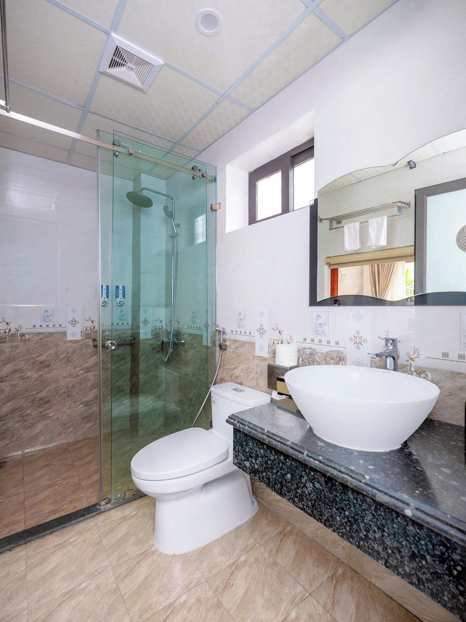 Shower, hydromassage showerhead, designer toiletries, hair dryer