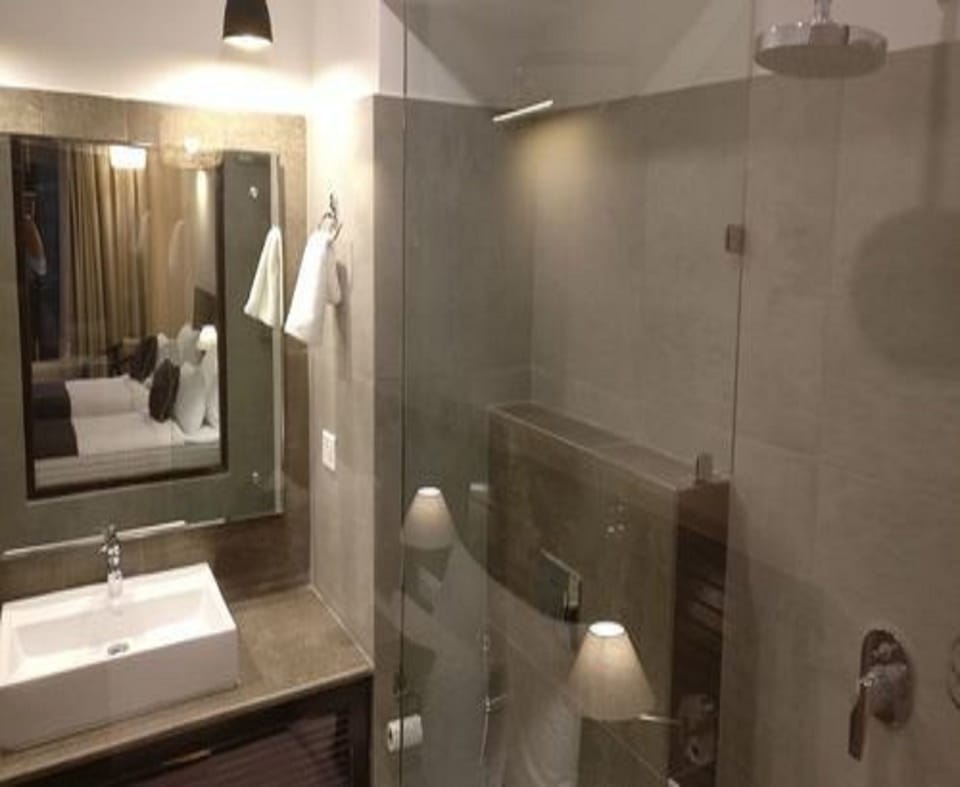 Shower, free toiletries, slippers, towels