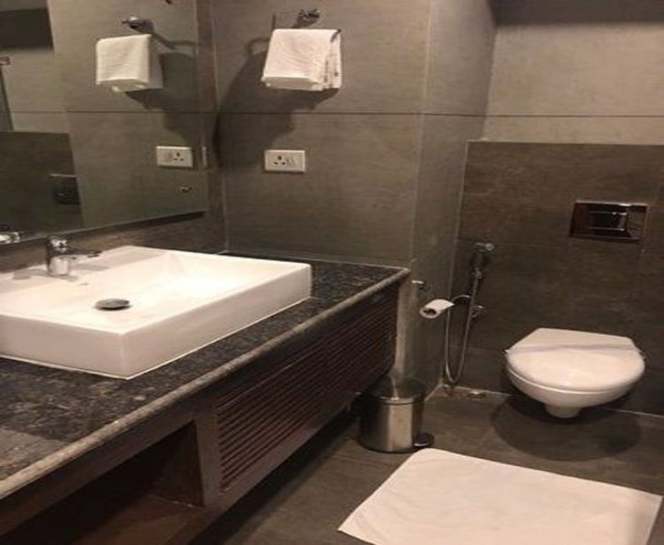 Shower, free toiletries, slippers, towels