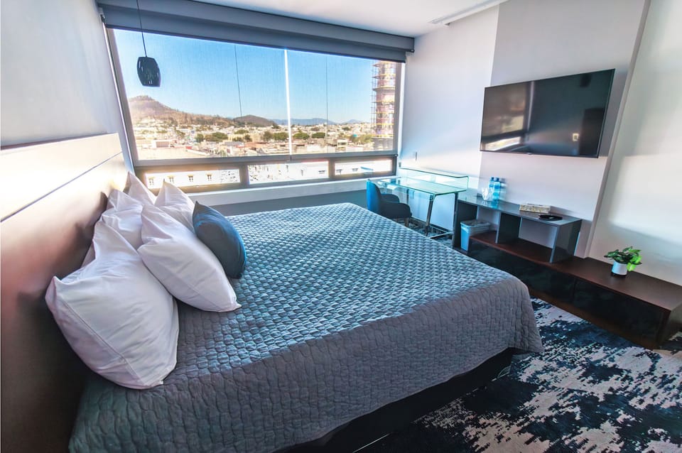 Superior Room, 1 King Bed | Premium bedding, down comforters, pillowtop beds, in-room safe