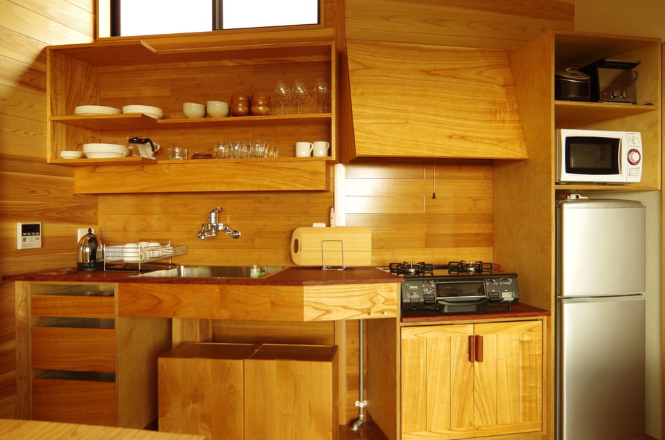 Holiday Home | Private kitchen | Coffee/tea maker, fridge, microwave, stovetop
