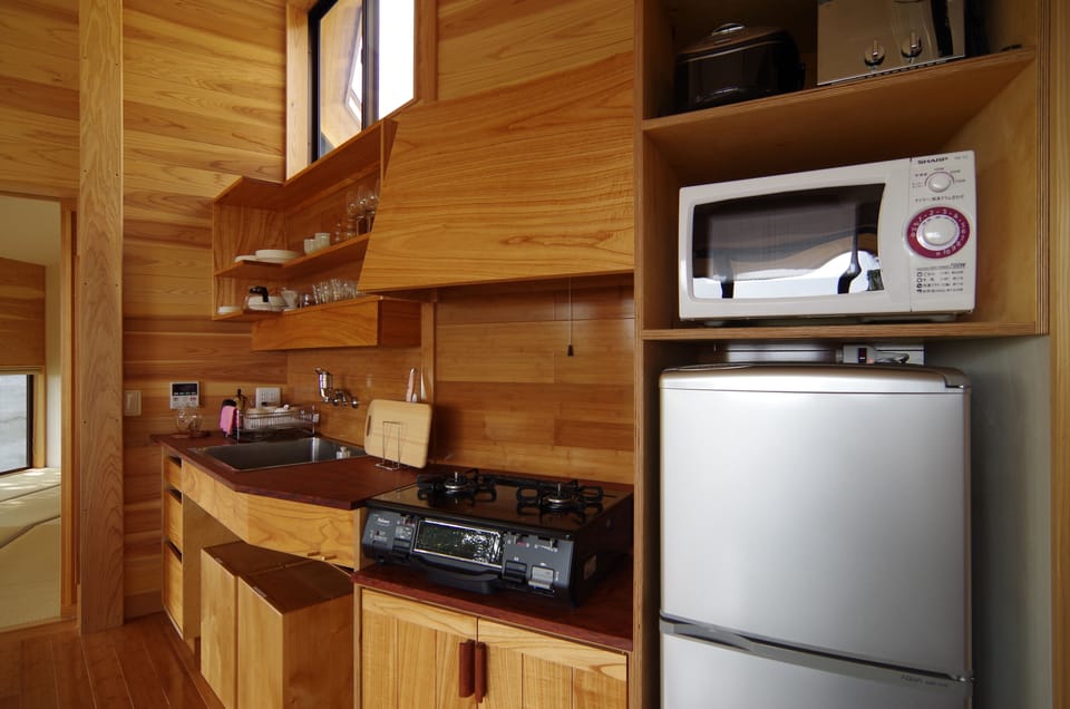 Holiday Home | Private kitchen | Coffee/tea maker, fridge, microwave, stovetop