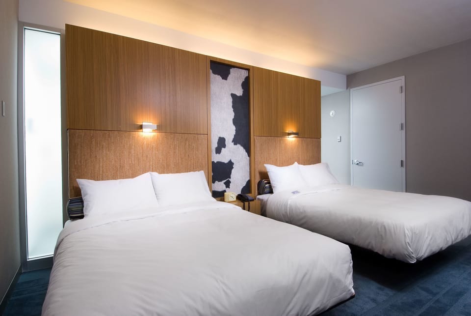 Premium bedding, desk, blackout drapes, iron/ironing board