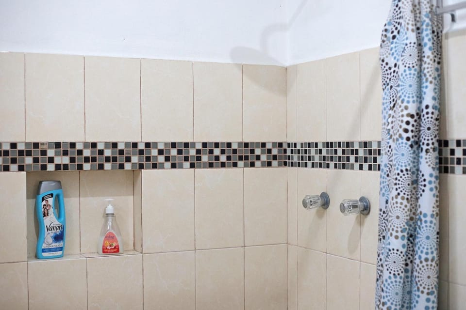 Shower, free toiletries, towels, soap