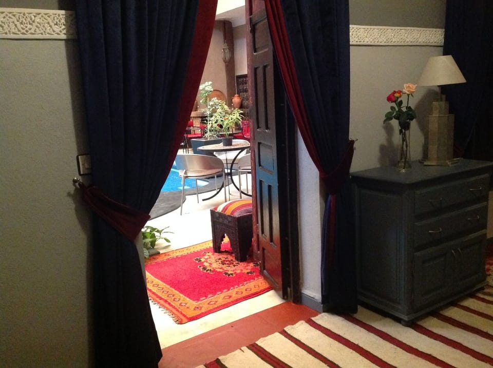 Standard Suite, Pool View (Suite MD) | Individually decorated, blackout drapes, iron/ironing board, free WiFi