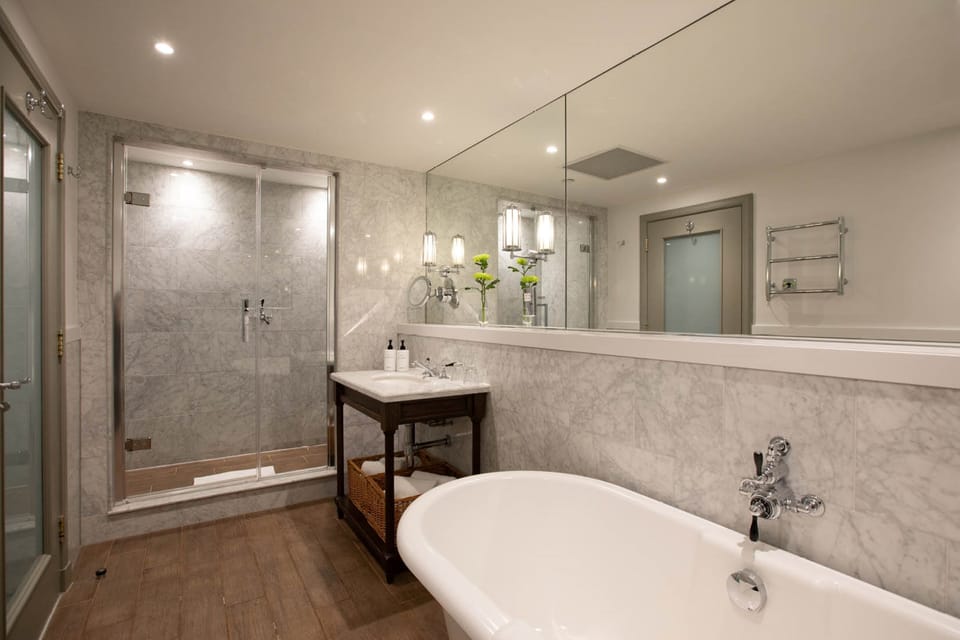 Suite, 1 King Bed (Ferrier) | Egyptian cotton sheets, premium bedding, minibar, in-room safe