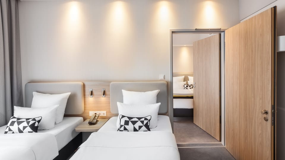 Standard Room, 2 Twin Beds | In-room safe, desk, laptop workspace, blackout drapes