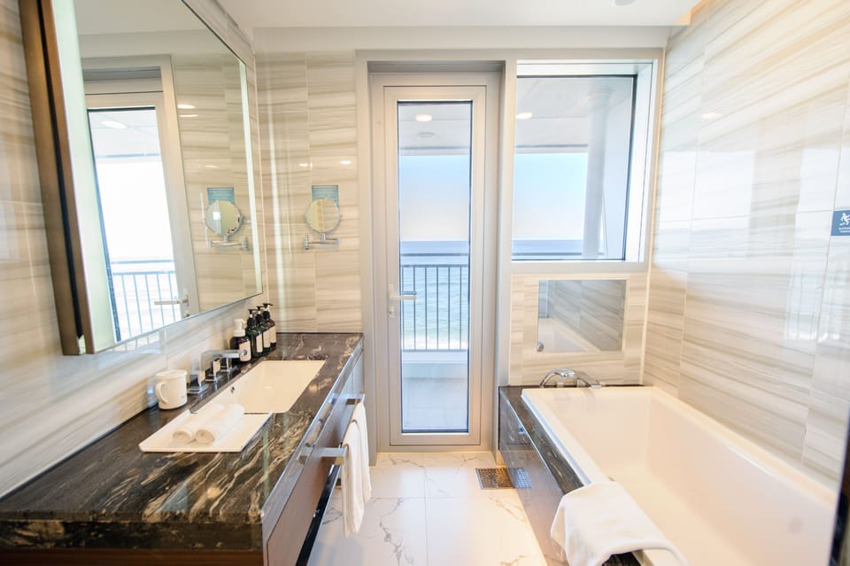 Junior Suite Twin Room, Ocean View | Bathroom | Hair dryer, bathrobes, bidet, towels