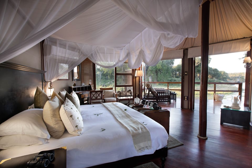 Suite | In-room safe, desk, bed sheets