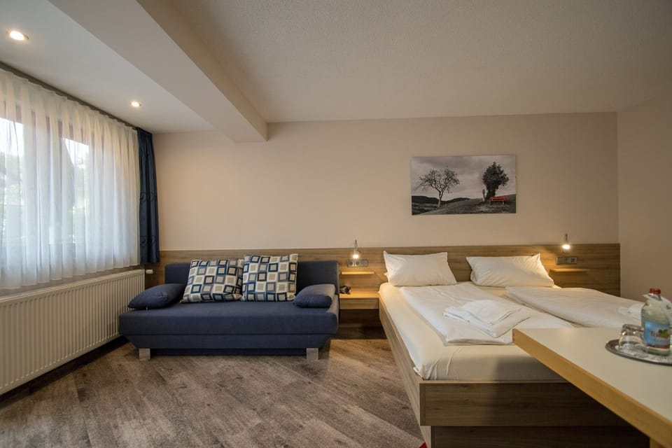 Double Room | Living area | 32-inch flat-screen TV with satellite channels, TV