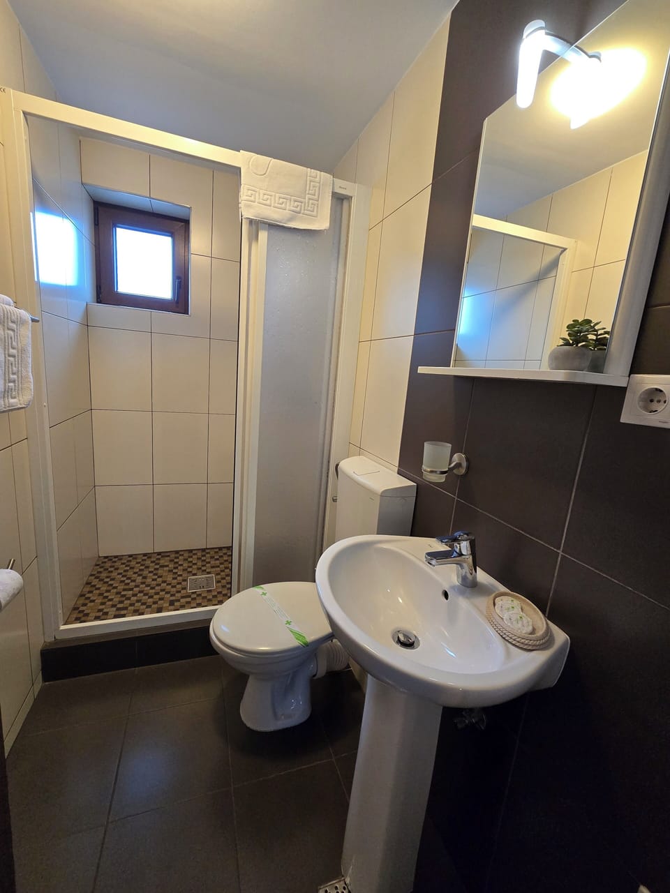 Shower, free toiletries, hair dryer, towels