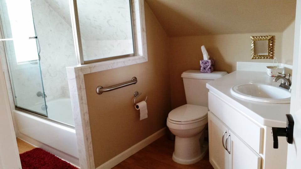 Full bathroom with tub/shower combo