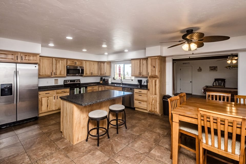 Fully stocked spacious kitchen with island!