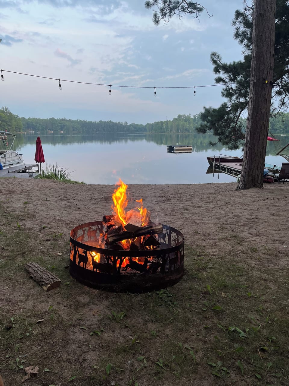 Warming up by an afternoon fire in late spring after an cool swim.