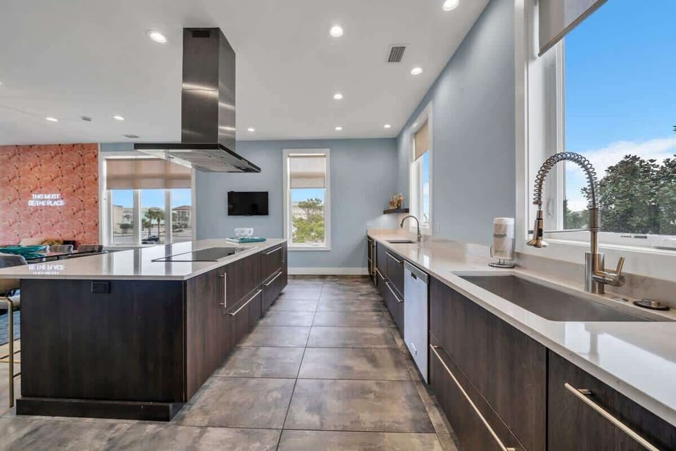 Tons of Natural Light and Open Counter Space Make This The Perfect Kitchen For Even The Most Challenging Of Cooking Feats!  
