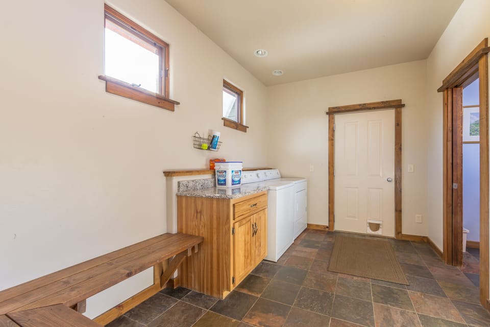 Mud room and door out to garage. 