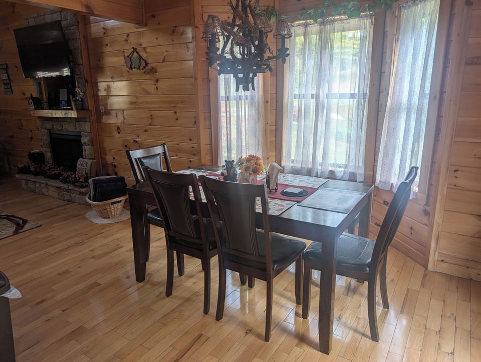 Dining area w/highchairs for the little ones & access to back porches