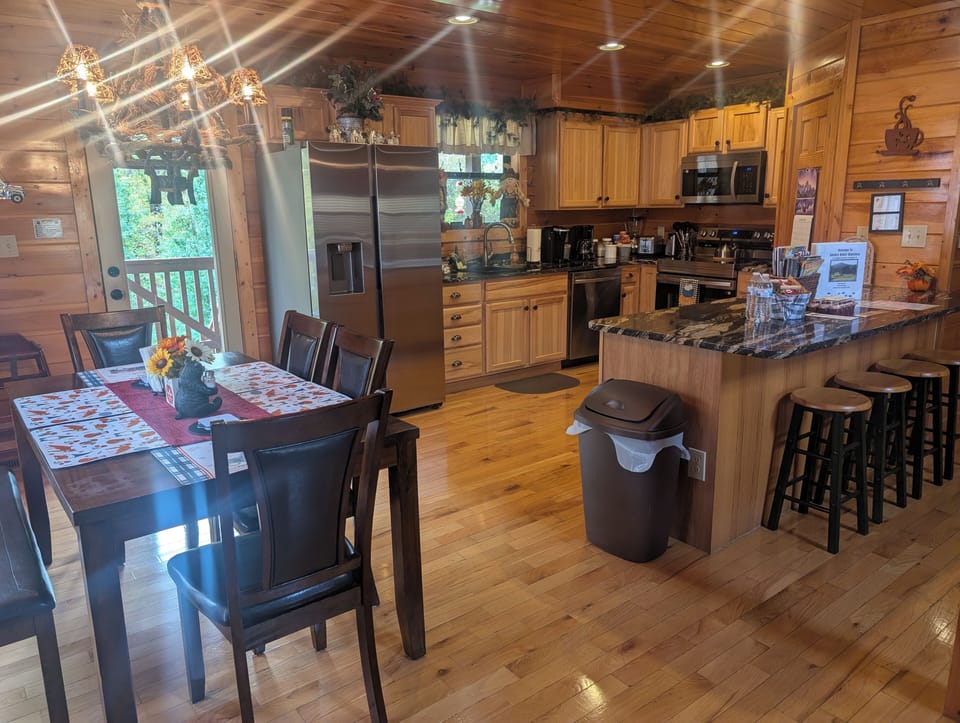 Open concept living area with spacious kitchen and dining area