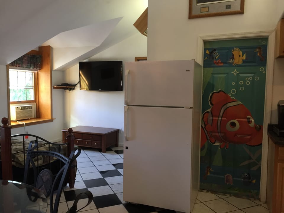 Air conditioned in the summer; radiant floor heat in winter