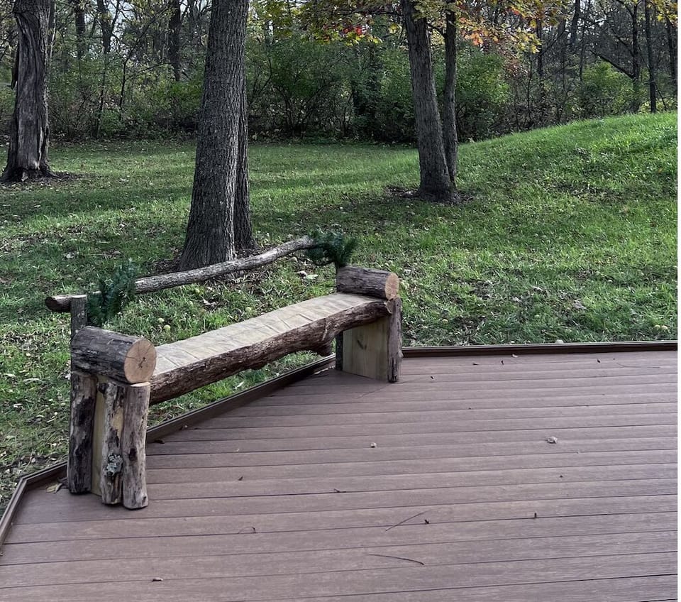 And a new back deck!  Bench made from trees on the property.  
