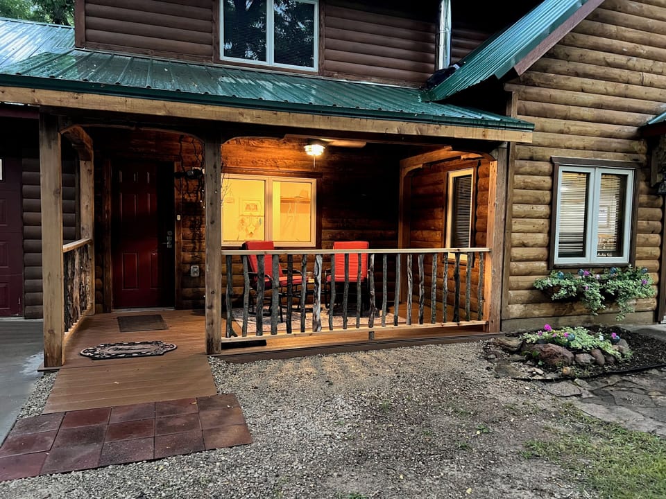 We added a porch!  Perfect for coffee in the morning or watching the sunset.

