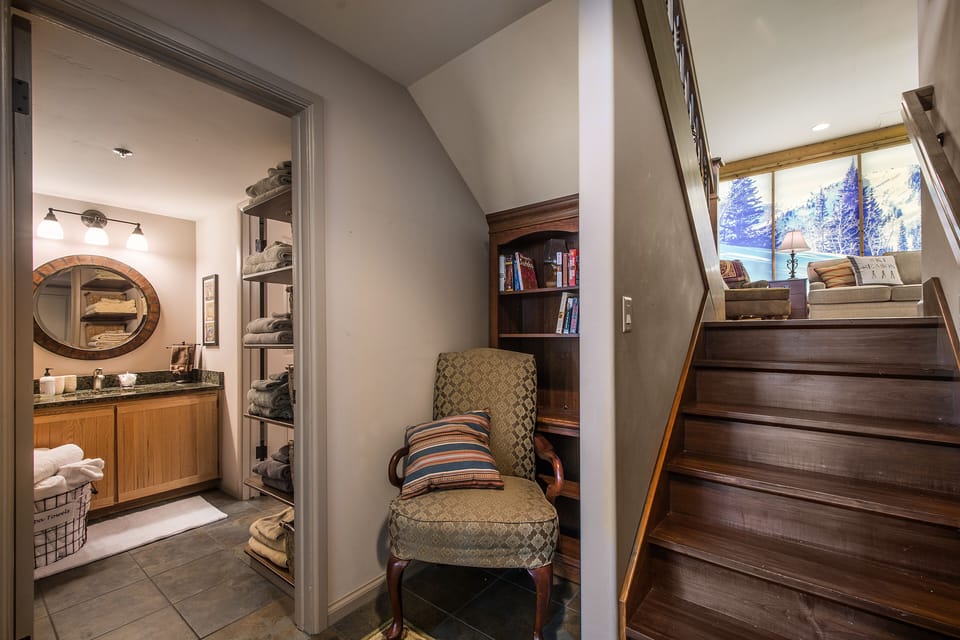 Downstairs hall, leading to two bedrooms and bathroom