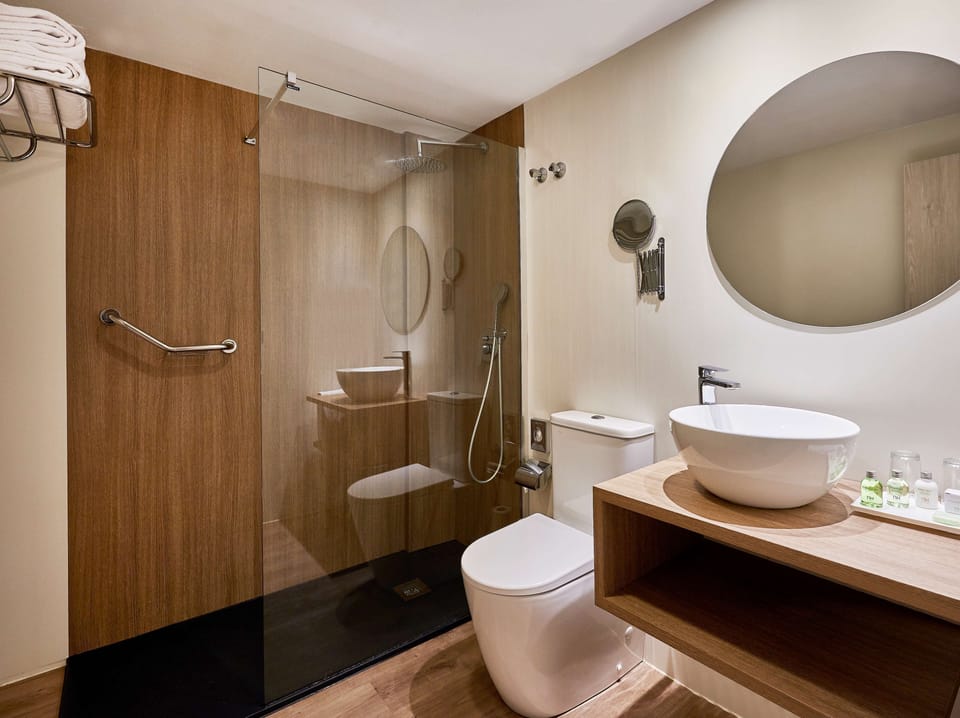 Combined shower/tub, eco-friendly toiletries, hair dryer, bathrobes