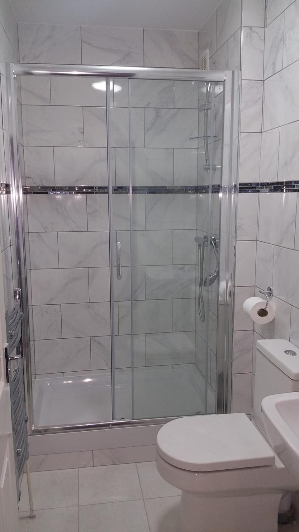 Shower, free toiletries, hair dryer, towels