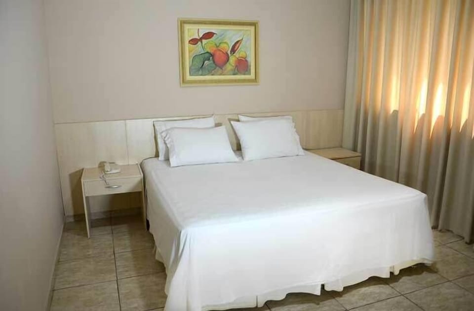 Deluxe Double Room | Minibar, desk, laptop workspace, blackout drapes