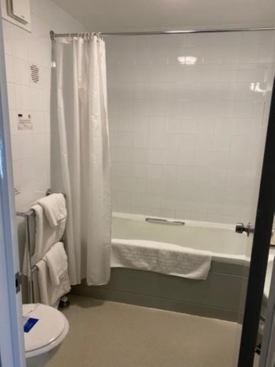 Combined shower/tub, hair dryer, towels, toilet paper