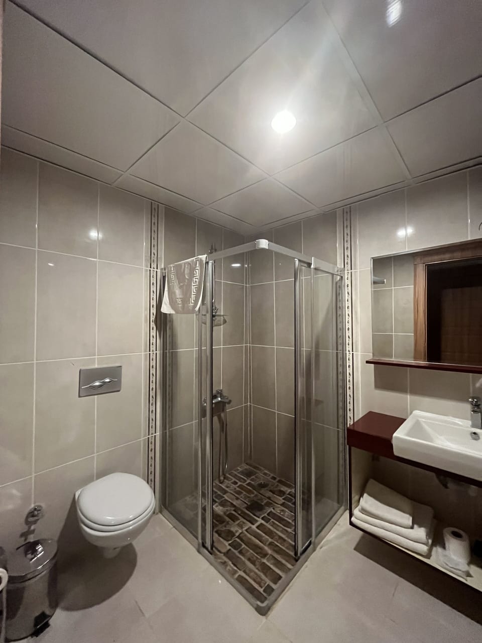 Shower, free toiletries, hair dryer, slippers