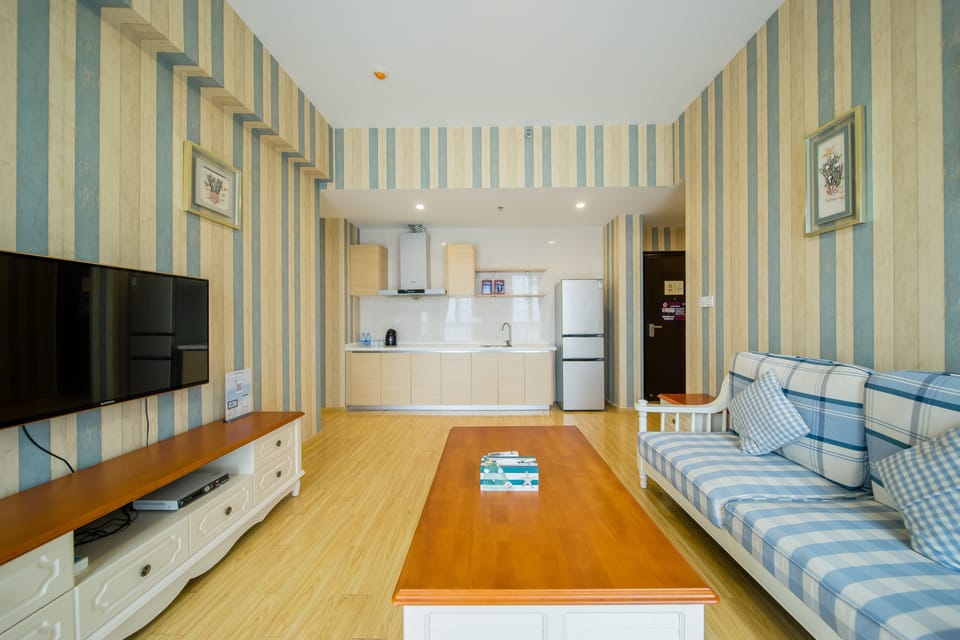 Deluxe Suite | Private kitchen | Fridge, microwave, stovetop, electric kettle