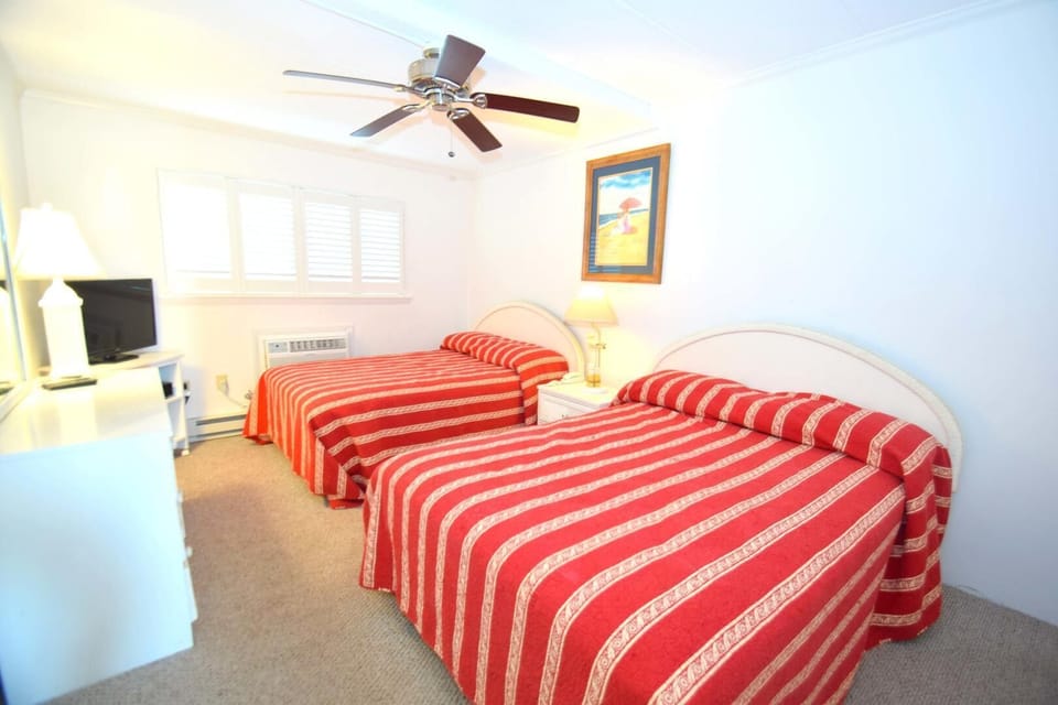 Condo, 1 Bedroom | 1 bedroom, laptop workspace, iron/ironing board
