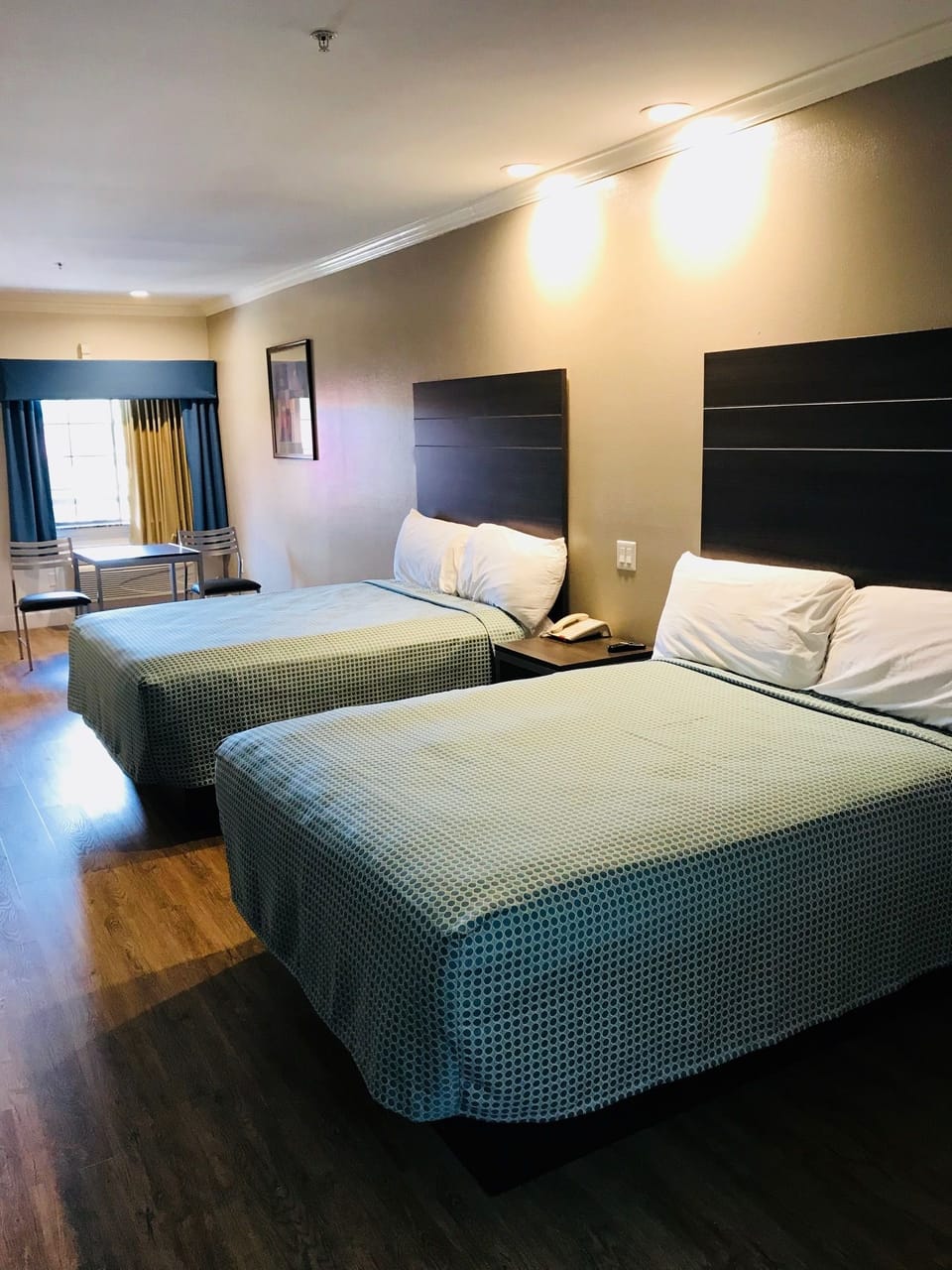Standard Room, 2 Double Beds, Smoking | Desk, iron/ironing board, free WiFi, bed sheets